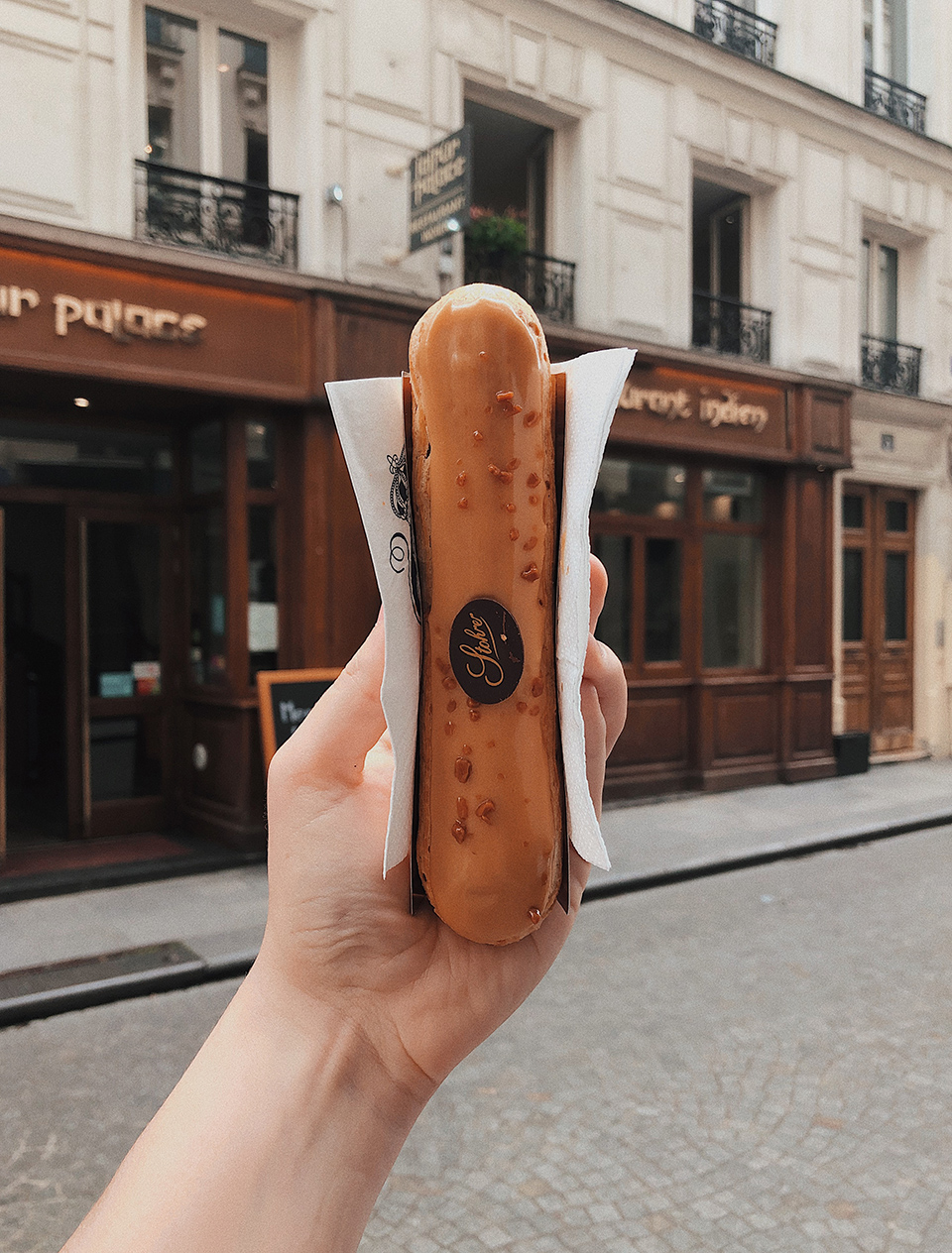 An salted caramel eclair bought at Stohrer in Paris